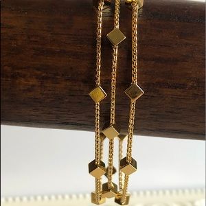 Monet Three strand goldtone bracelet unique design